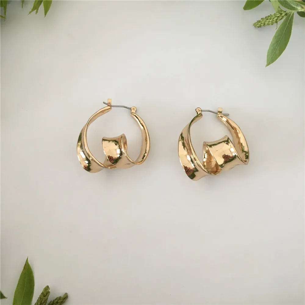 

TRENDY GOLD COLOR PLATING TWIST SCULPTURE WOMEN EARRINGS UNIQUE