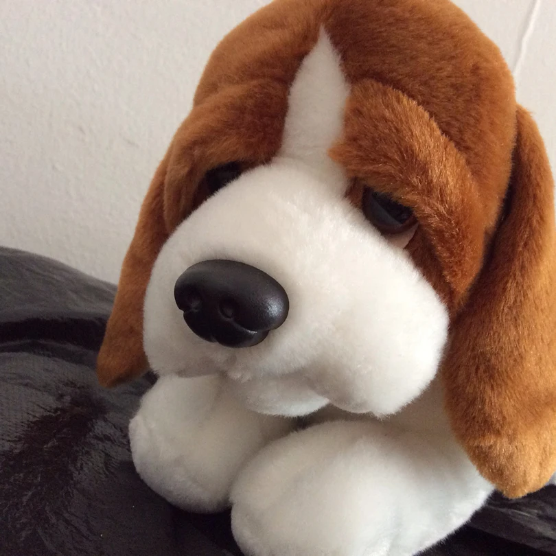 stuffed animal dog with puppies in belly