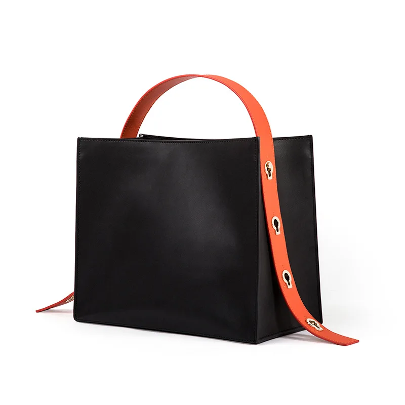 

Niche Designer Hundred Simple Tide Personality Large Capacity Tot Commuter Female Spring Cow Leather Woman Bag