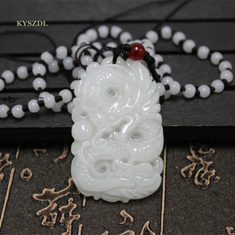 

Xinjiang Hetian jade white jade pendant ERON old pit dragon pearl Jade Jade Dragon Pendant Zodiac Sign