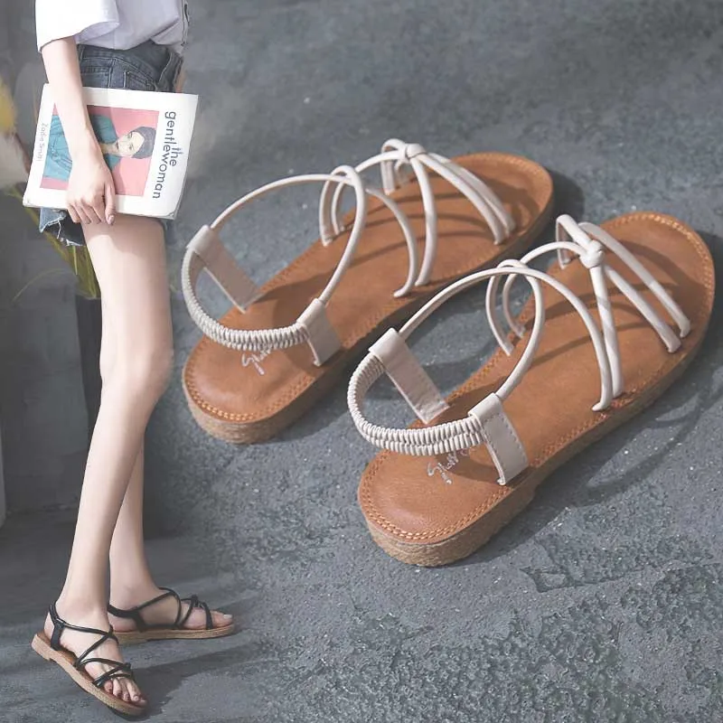 

Sandals female summer flat student simple 2019 new wild chic cross thin belt net red with Roman beach shoes