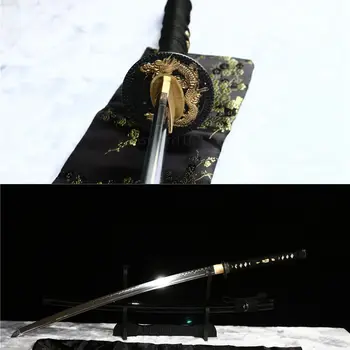 

Handmade Clay tempered differential hardened japanese katana sword real hamon.