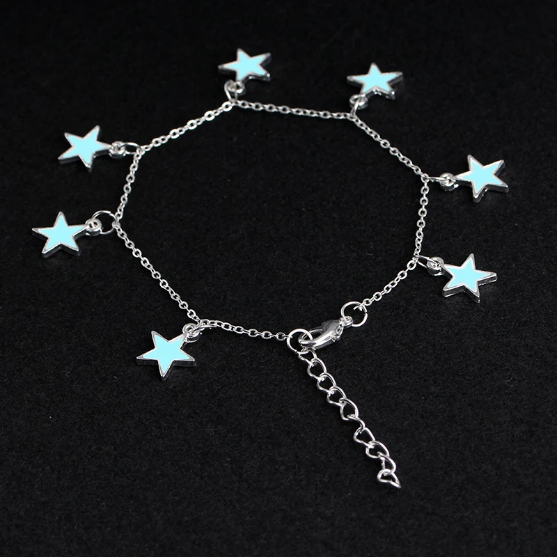 

Fashion temperament Bohemian sand fluorescent beach wind five-pointed star tassel ladies luminous hands and feet cable chain
