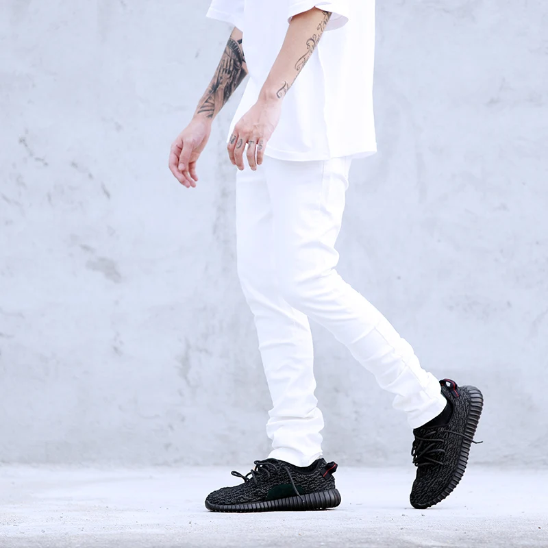 black and white pants with faces on them