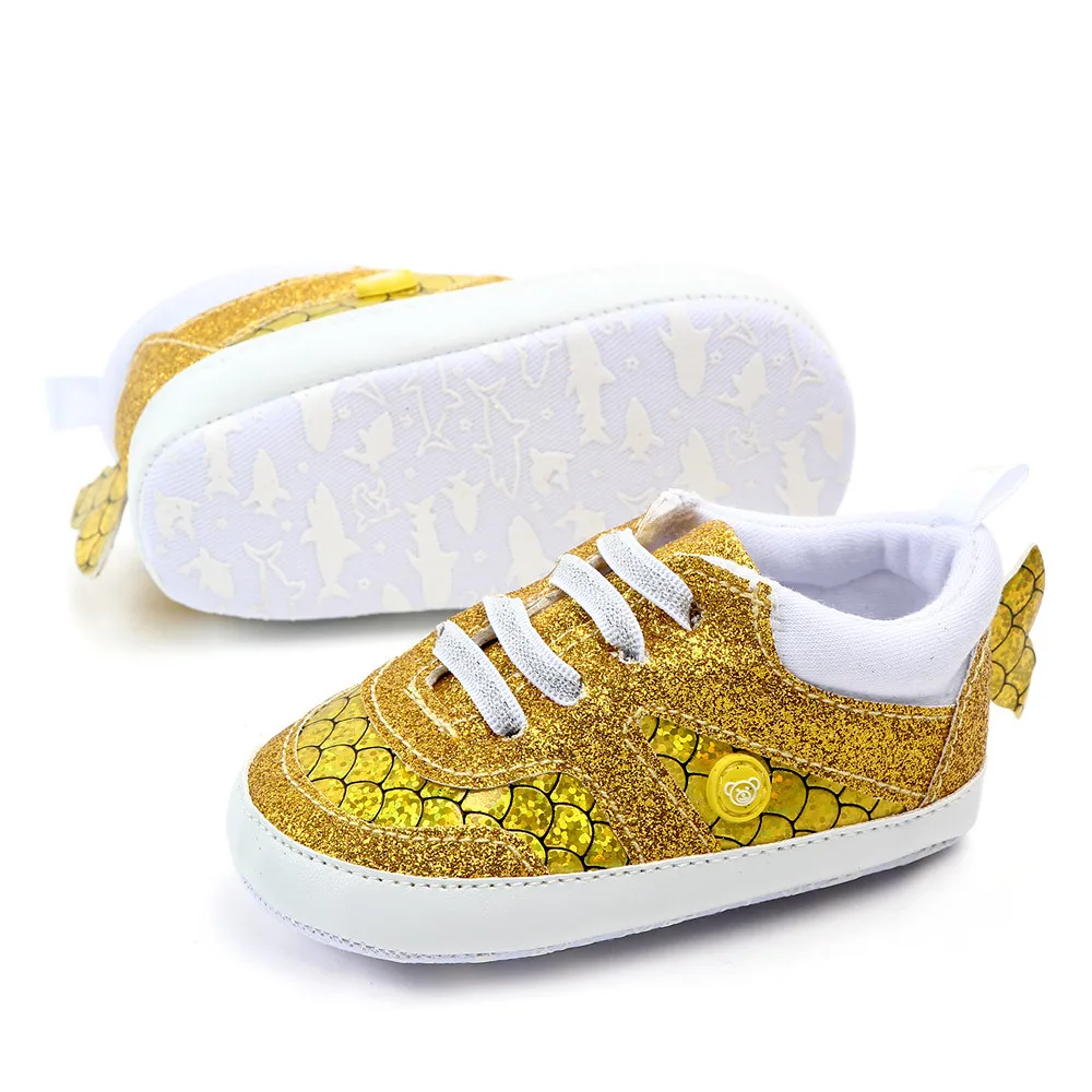 gold baby sneakers