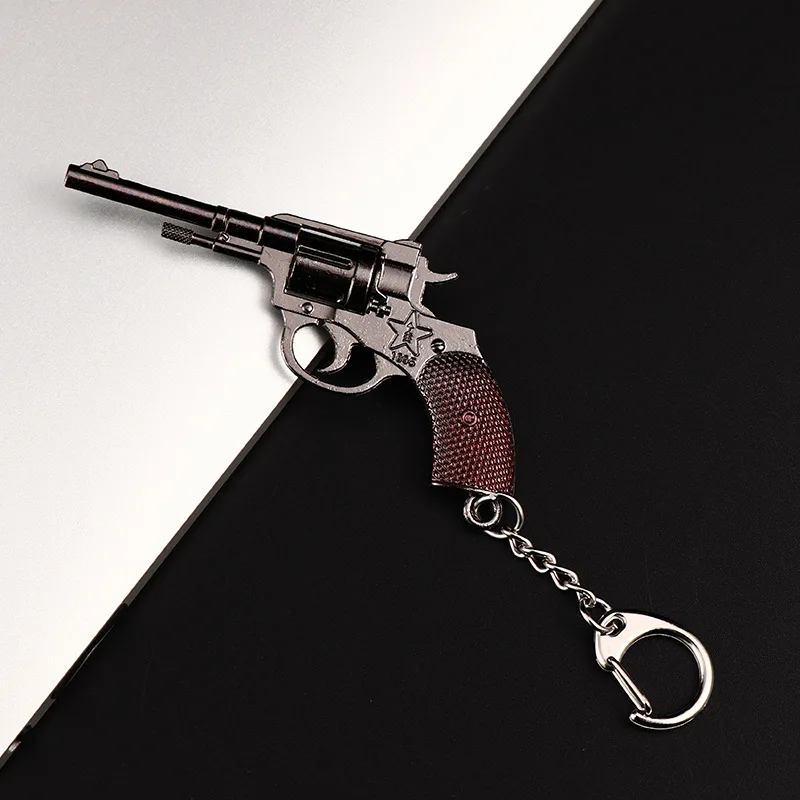 The New Fashion Miniature Revolver Pistol Weapon fashion Model Key Ring Mini Gun key Chain For Men Jewelry Surprise Gift The New Fashion Miniature Revolver Pistol Weapon fashion Model Key Ring Mini Gun key Chain For Men Jewelry Surprise Gift