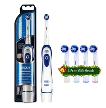 Электрическая зубная щетка