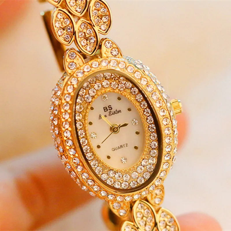 

New Elegant Woman Watch Fashion Women Watch Top Luxury Women Rhinestone Casual Dress Quartz Wristwatch Bracelet reloj mujer