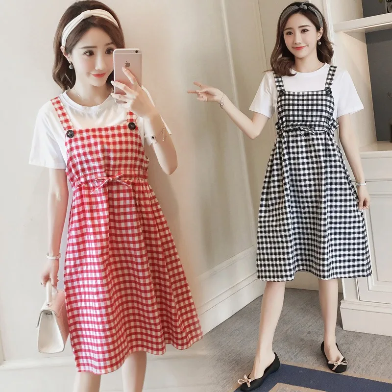 

Korean version of the loose pregnant dress Korean version of the cotton T-shirt + plaid strap in the long section of pregnant wo