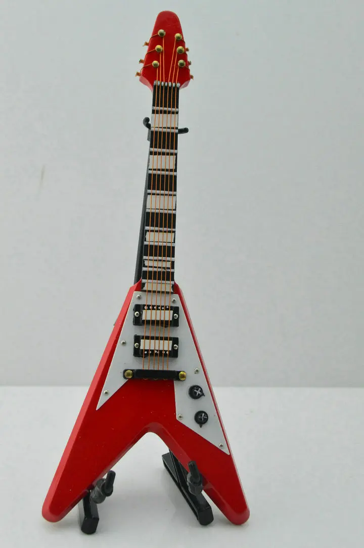 red toy guitar