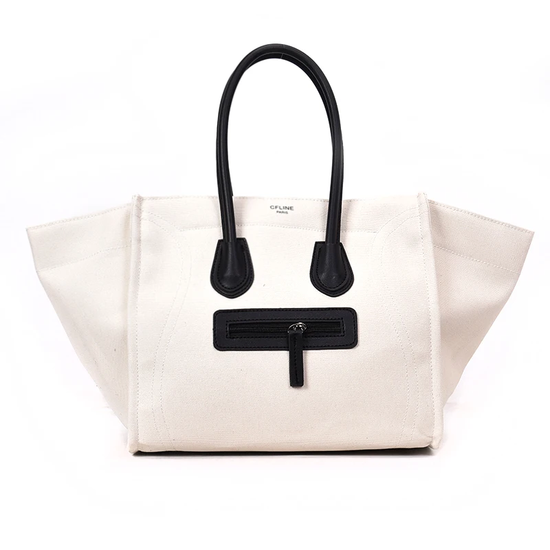 

Big bag female 2019 new European and American fashion handbag canvas smiley bag bag tide ins super fire wings package