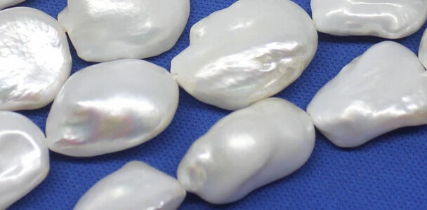 

huij 00711 1Strand WHOLESALE GENUINE KESHI BAROQUE WHITE PEARL LOOSE STRAND
