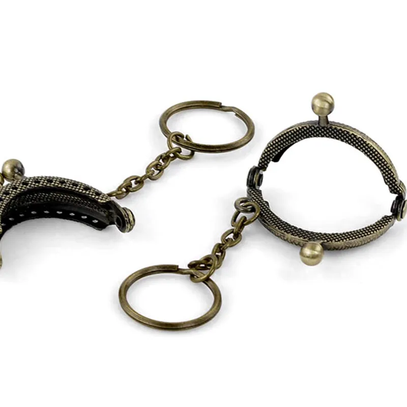 

50Pcs Antique Bronze Tone Vintage Clutch Coins Purse Metal Arc Frame Kiss Clasp Key Ring Handbag Handle Findings 4.2x3.5cm