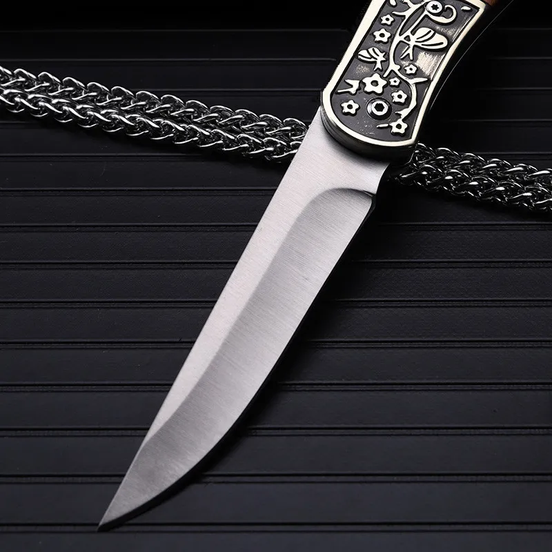 2016 high quality outdoor folding knife self-defense wilderness survival with high hardness knife wild fruit knife plum blossom