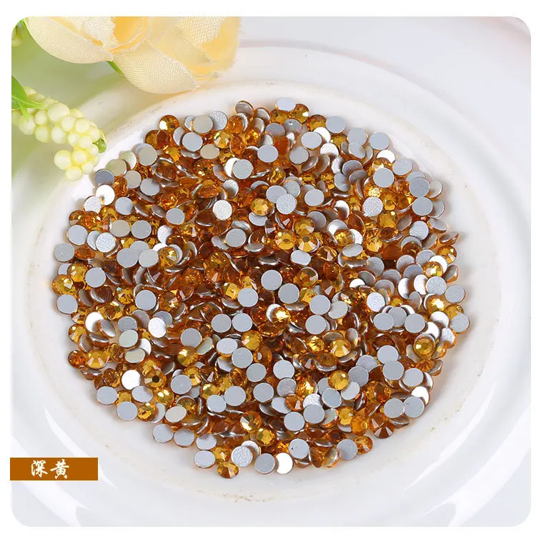 

Hot Sale SS3-SS34(1.3MM-7MM) golden yellow flatback 3D rhinestones for nail art,DIY mobile phone shell and hair jewelry