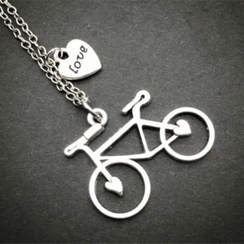 

1Pcs Retro Tibetan Silver Bike peach heart love Charm Necklace NEW