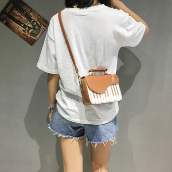 

Bag female slung small new vibrating network red small black bag Korean students wild piano bag