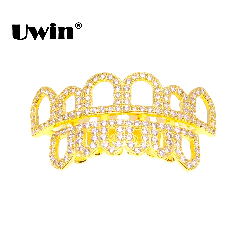 

Uwin Full Iced Out Cubic Zirconia Gold Color Teeth Grills Hiphop Rocker Hollow Caps Top&Bottom Dental Grills Set Body Jewelry