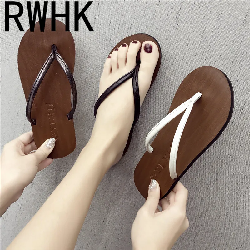 

RWHK 2019 new couple flip flops female summer slip flat with fashion wear slippers black simple beach shoes tide B050