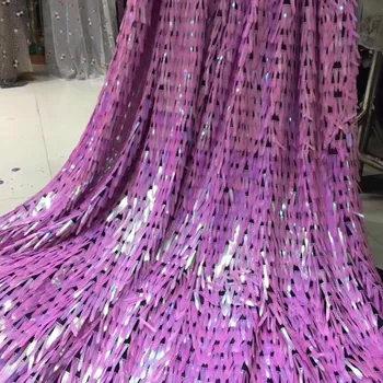 

latest version of a large sequined lace fabric holographic image, with colorful Latin clothing fabrics and a major holiday party