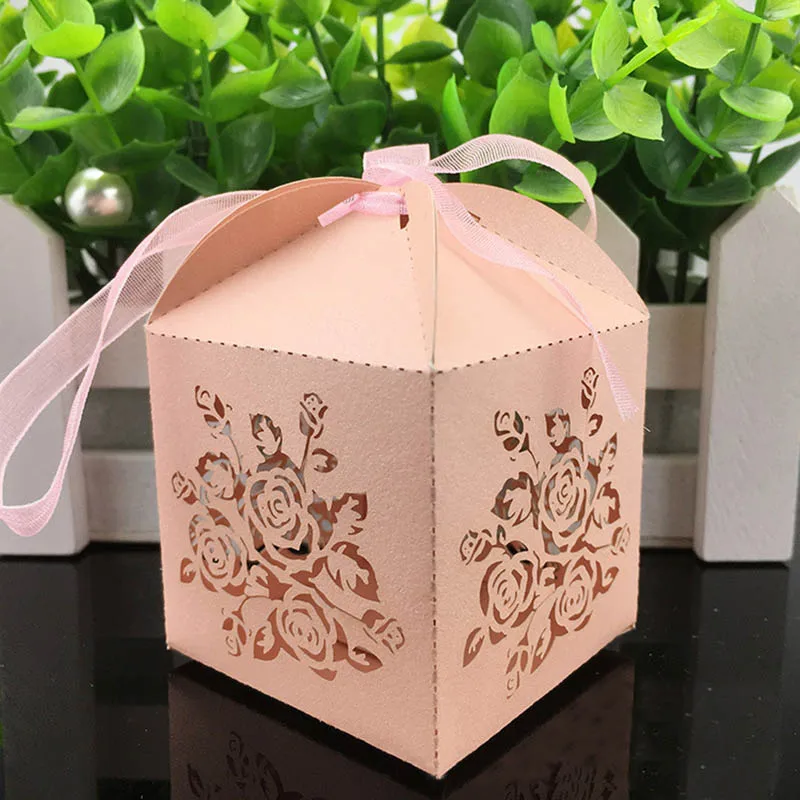 

2019 Flowers Candy Boxes Laser Cut Hollow PatternWedding Baby Shower First Communion Paper Box with Ribbon For Gift NBD