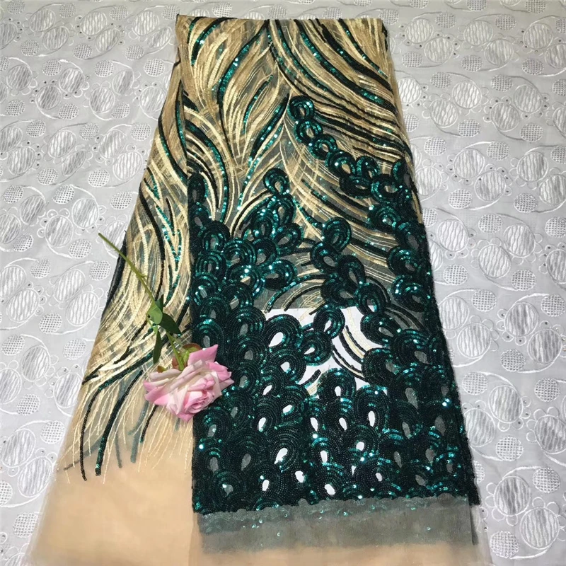 

Tollola New Design Hot Sale Nigerian Lace Fabric,Fashion African Kano Sequins Swiss Voile Lace in Switzerland High Quality