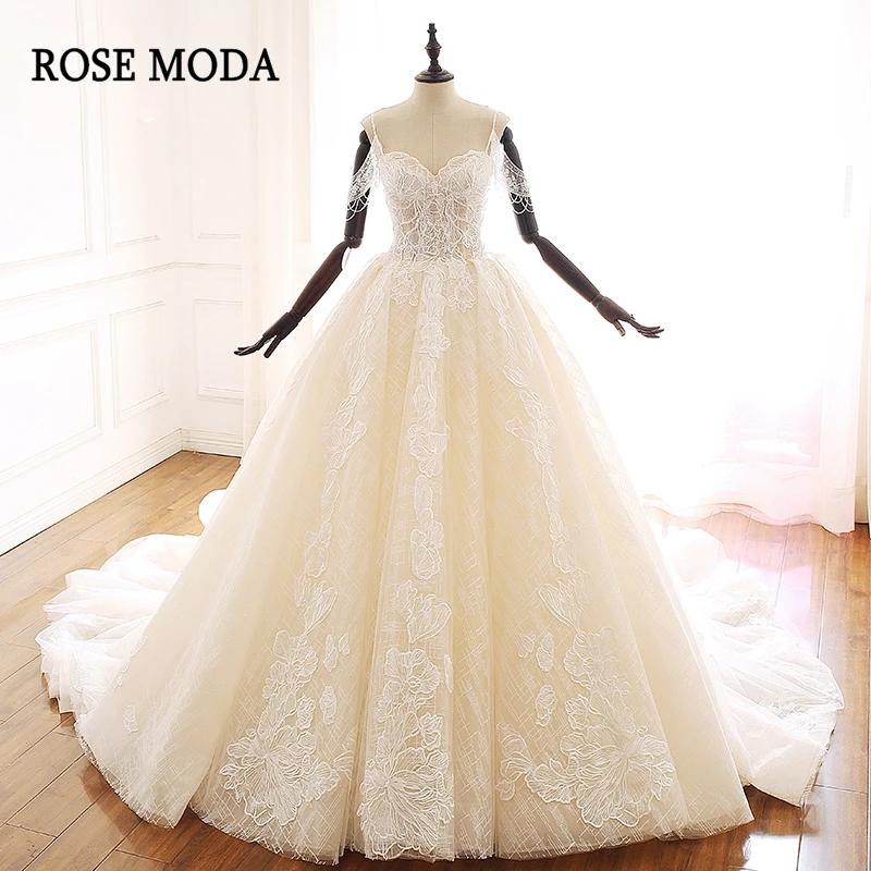 

Rose Moda Luxury Lace Wedding Dress 2019 with Crystals Off Shoulder Ivory over Champagne Lace Bridal Dresses with Train