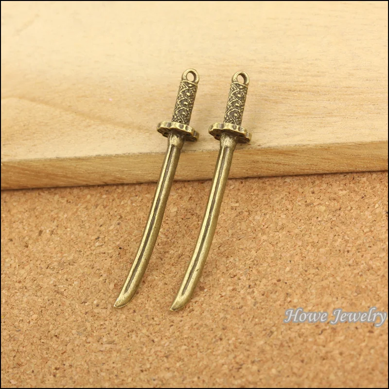 12pcs quality Antique bronze Japanese samurai swords Pendant Alloy DIY