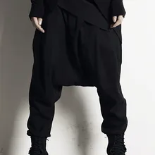 Новинка мужские весенние повседневные висит промежность Штаны плюс размер висит промежность Штаны личность alcoholicity Штаны "клёш от колена"