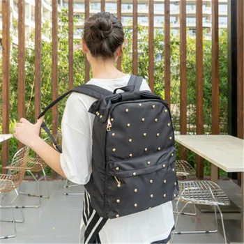 

Milk bear Girls College Wind Rivet Butterfly Knot Shoulder Waterproof Large Capacity Bag