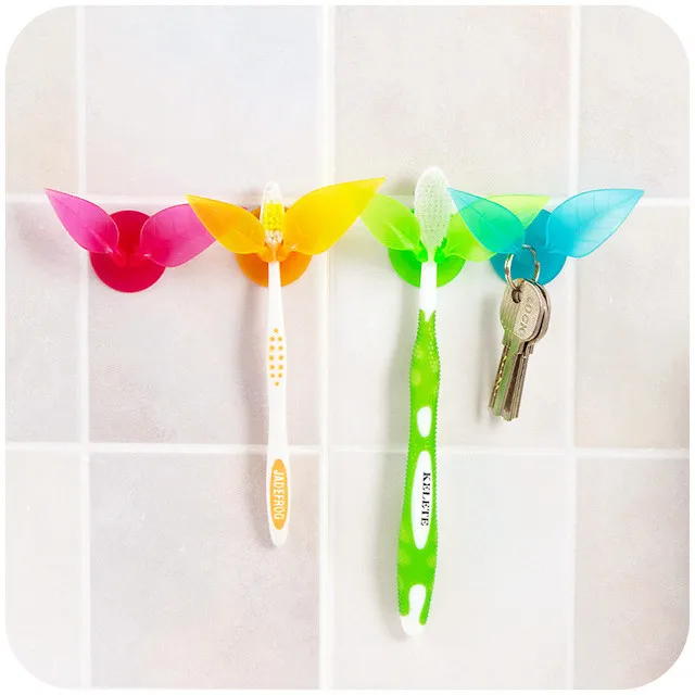 

New Free shipping multifunctional toothbrush holder suction cup leaves styling,creative and practical compact rack,razor holder