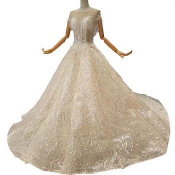 

2018 Champagne Bling Bling Sequins Bead Lace Sleeveless Scoop Cathedral Train Wedding Dress Backless Illusion Bridal Gowns