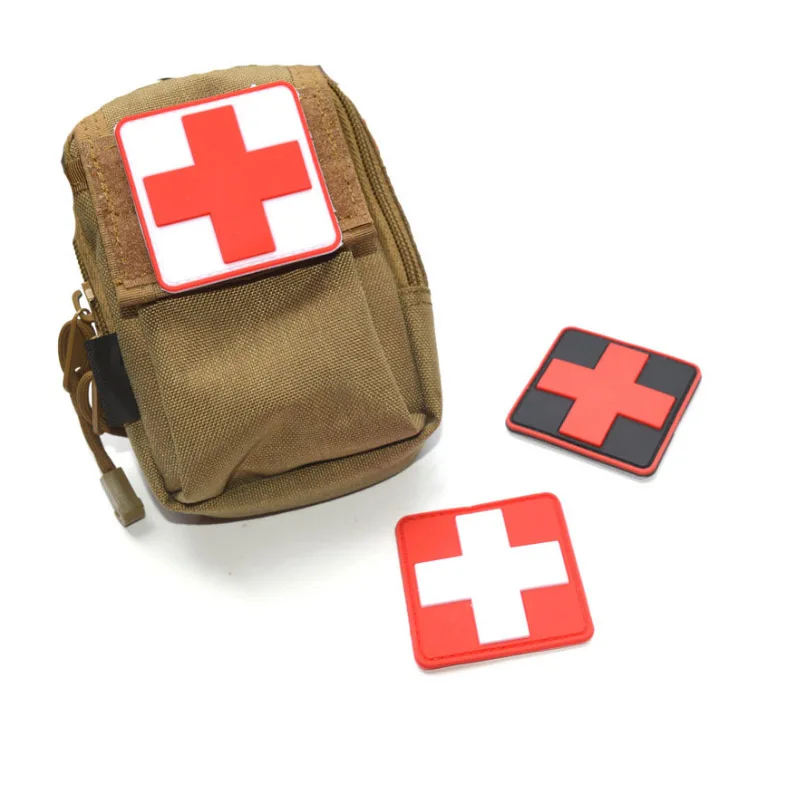 

Hot PVC Red Cross Armband Medical Treatment Logo Tactical Armbands Waterproof Rubber Decorate Patch For Bag Hat Team Logo