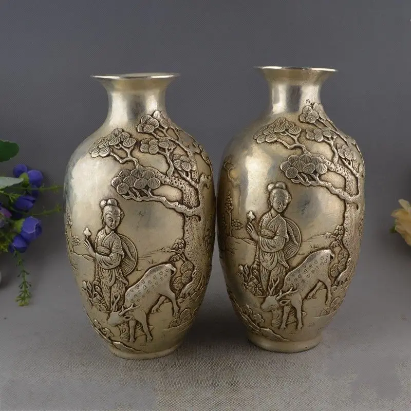 

Marked Chinese Miao silver longevity Immortal deer lucky vase statue pair