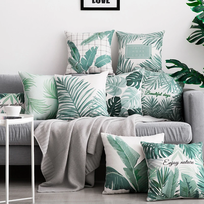 grey couch green pillows