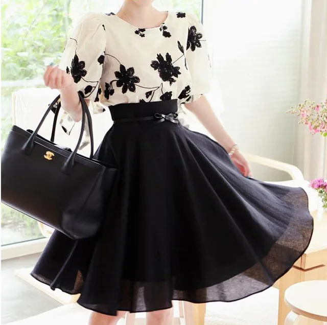 https://ae01.alicdn.com/kf/HTB1AZ2.HFXXXXc2aXXXq6xXFXXXO/Women-Skirt-2015-Spring-Elegant-Chiffon-Skirts-For-Office-Plus-Size-Solid-Black-Women-Long-Skirt.jpg_640x640.jpg