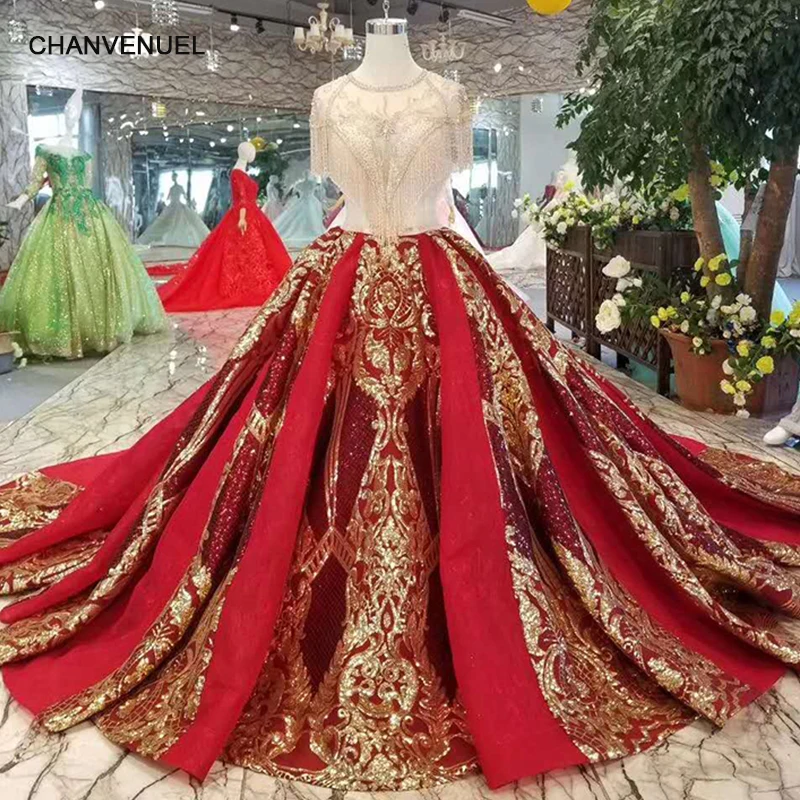 red and gold gown with sleeves