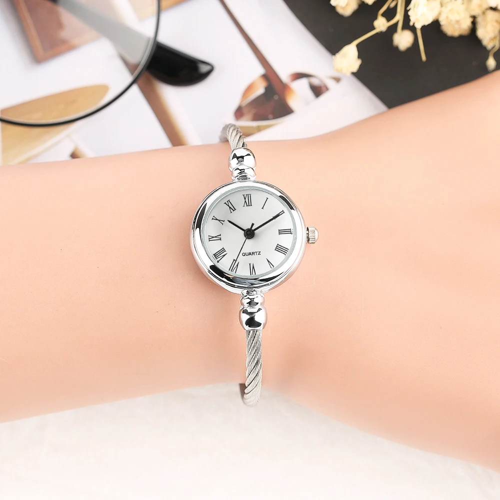 Elegant 2018 New Arrival Women Bangle Watch Roman Number Dial Quartz Wrist Watch Simple Rotating Twist Stainless Steel Band (28)