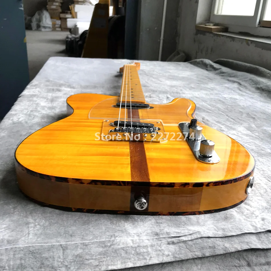 

Yellow electric guitar, flame maple veneer, customized service