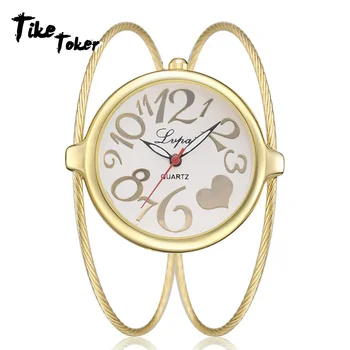 

TIke Toker,Fashion Luxury Strap Women Dress Watches Heart Creative Quartz Clock Ladies Alloy Bracelet Watch Relogio Feminino New