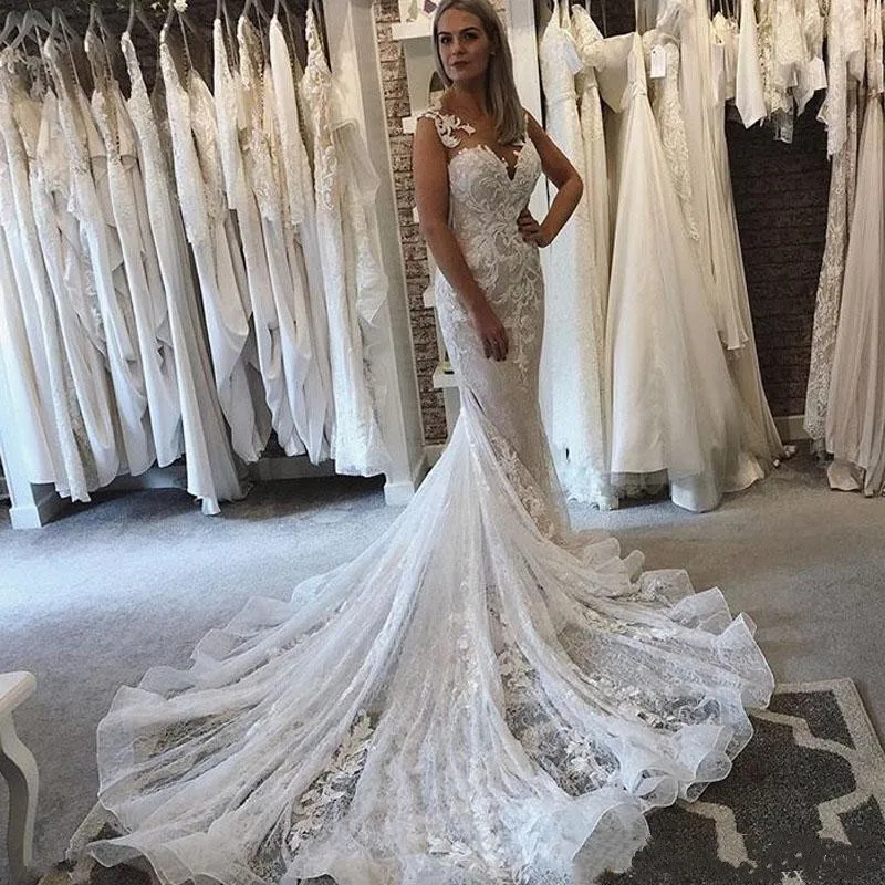 2019-lace-mermaid-wedding-dresses-sheer-neckline-sleeveless-lace-appliques-illusion-back-covered-button-chapel-train-wedding-bridal-gowns