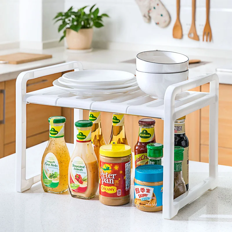 Under stainless steel sink racks, and kitchen supplies storage