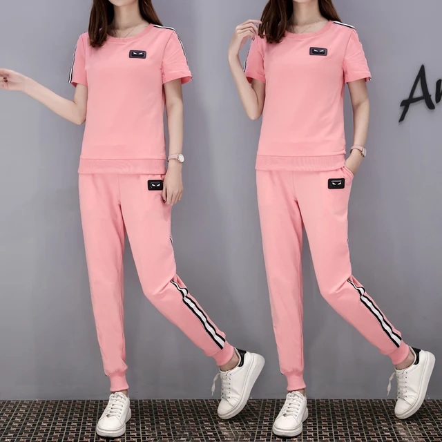 Cheap 2018 Ms. new temperament fashion casual pure color short-sleeved clothes + loose small fresh trend pants two-piece suit Cheap 2018 Ms. new temperament fashion casual pure color short-sleeved clothes + loose small fresh trend pants two-piece suit