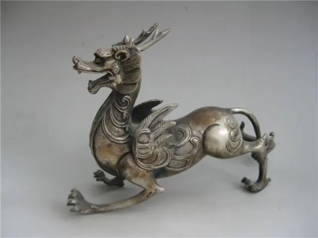

Elaborate Chinese Collectible Decorated Handwork Tibetan Silver Flying dragon Statue