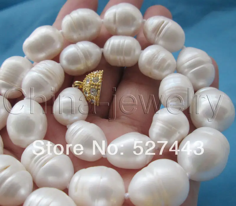 

Wholesale free shipping >>Huge 17.5" 19mm natural white baroque rice freshwater pearl necklace - magnet zi