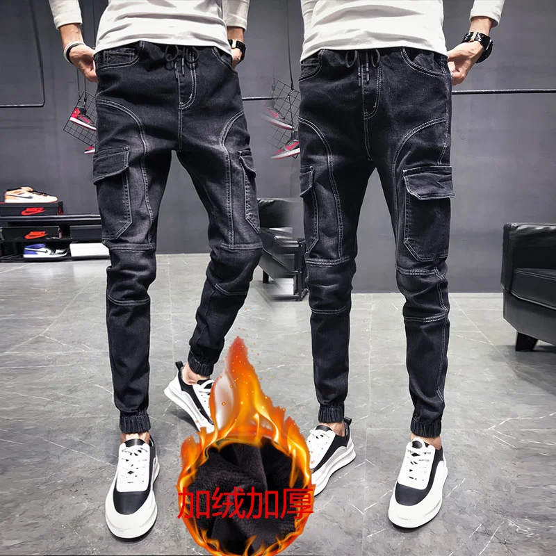 

2018 autumn and winter men's jeans Korean version of the slim feet pants trend social spirit guy handsome male pants