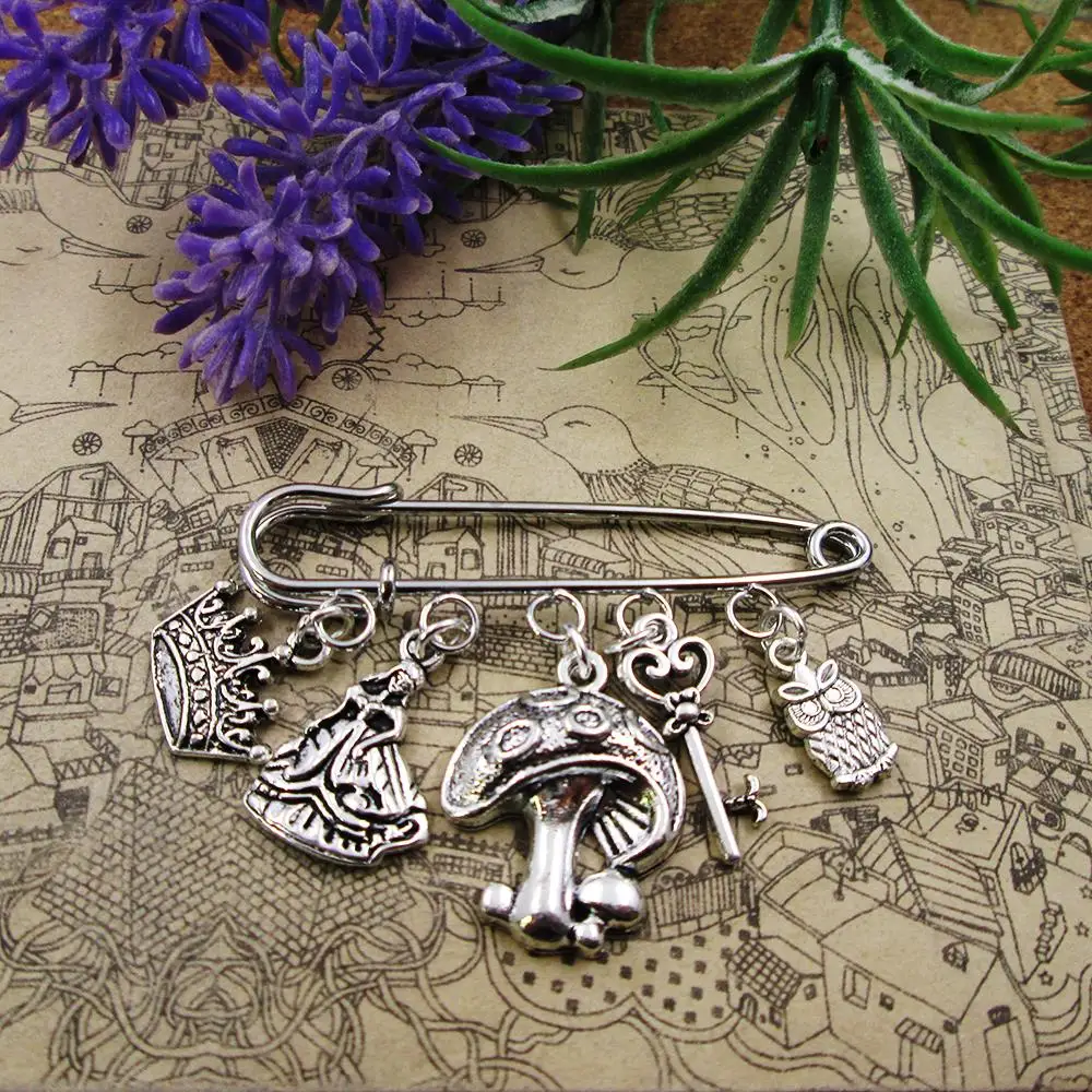 

alice in wonderland tale as old as time fairy tale silver plated charm brooch