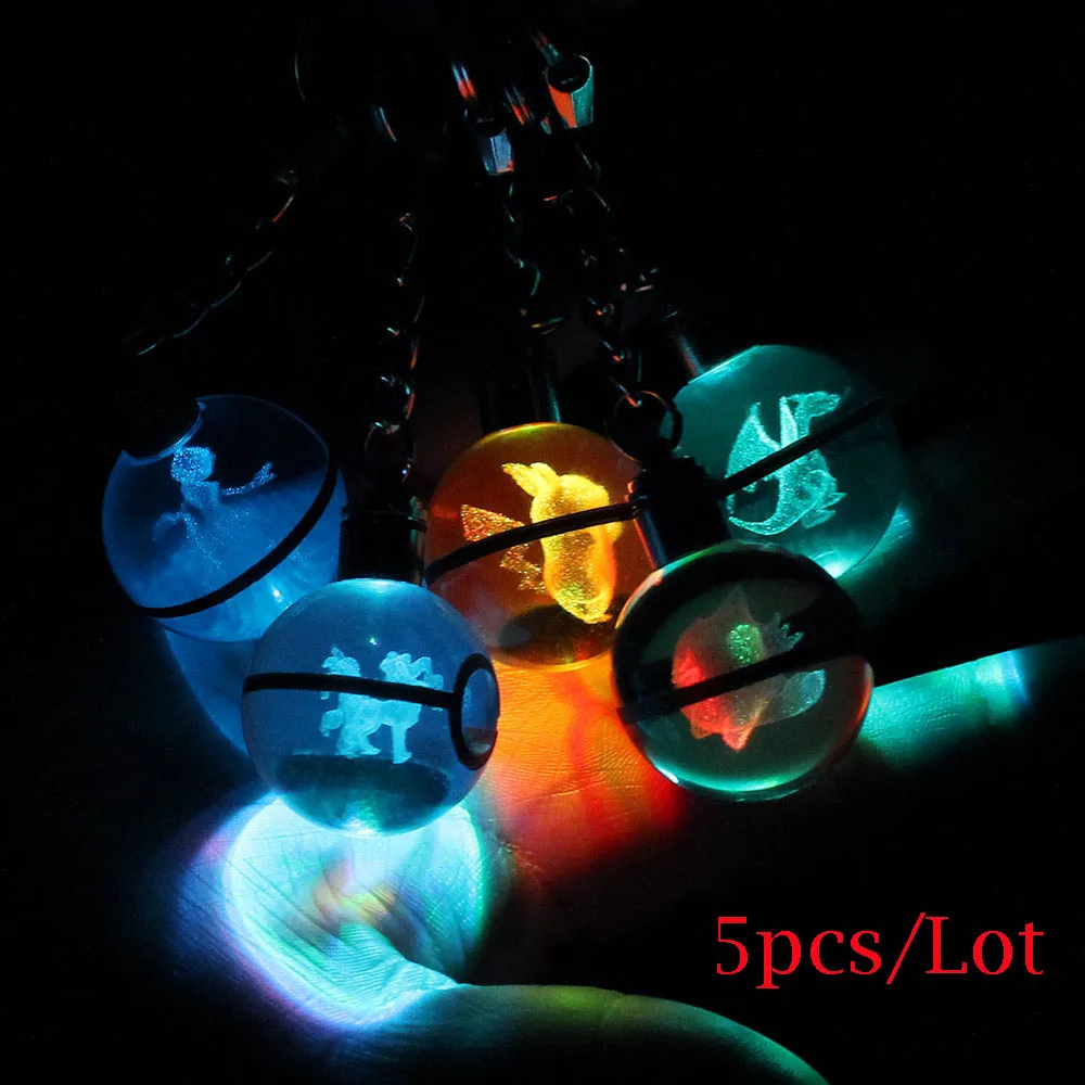 

5pcs/Lot Hot Game Pokemon Go Engraving Round 3D Crystal Ball LED Keychain Colorful Pendant Child Christmas Gift