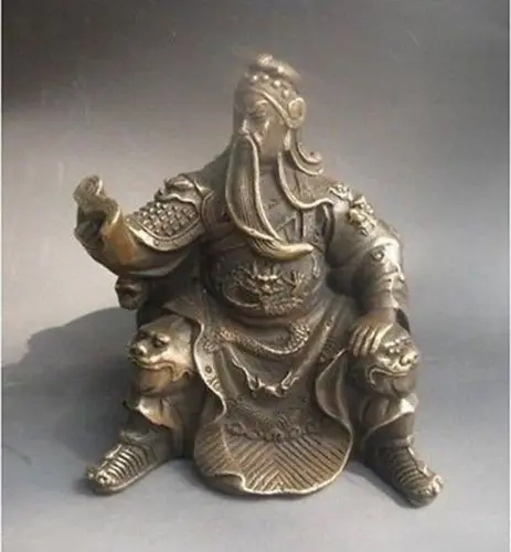 

Delicate Chinese hand-carved copper statue of Guan Gong reading