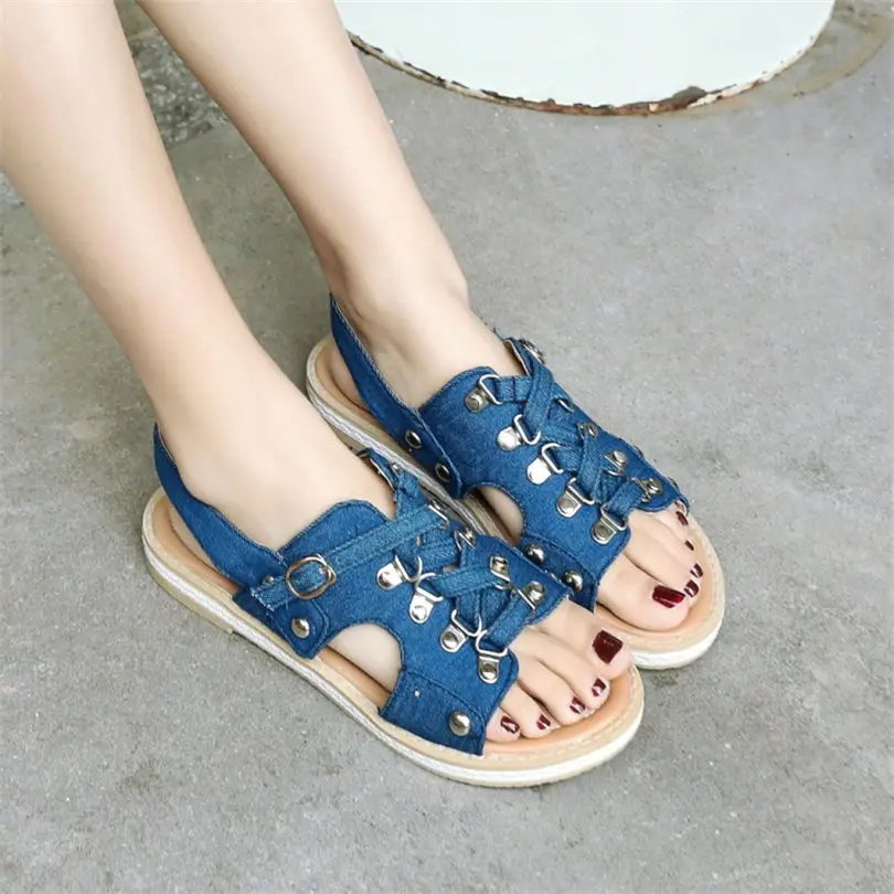

NAYIDUYUN Women Canvas Back Strap Roman Gladiator Sandals Open Toe Party Flats Oxfords Shoes Casual Shoes Rivets Flip Flops